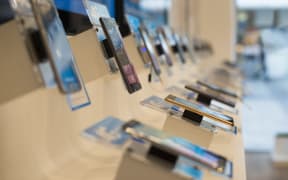 Smartphones in a shop. Technology shopping.