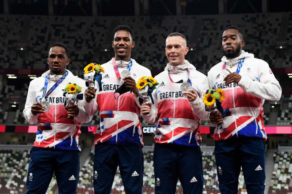 Silver medallists Britain's Chijindu Ujah, Zharnel Hughes, Richard Kilty, Nethaneel Mitchell-Blake, Tokyo Olympic men's 4x100m relay.