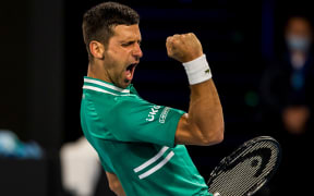 MELBOURNE, VIC - FEBRUARY 12: Novak Djokovic of Serbia celebrates after winning a game during round 3 of the 2021 Australian Open on February 12 2020, at Melbourne Park in Melbourne, Australia. (Photo by Jason Heidrich/Icon Sportswire)