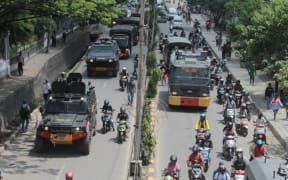 Indonesian police vehicles attend to mass mobilisations in Jayapura, Papua province, August 2019