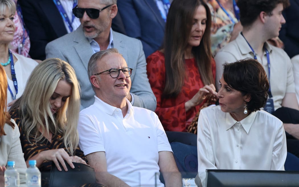 Australian Prime Minister Anthony Albanese looks on prior to the men's singles final match between Russia's Daniil Medvedev and Italy's Jannik Sinner on day 15 of the Australian Open tennis tournament in Melbourne on January 28, 2024. (Photo by Martin KEEP / AFP)