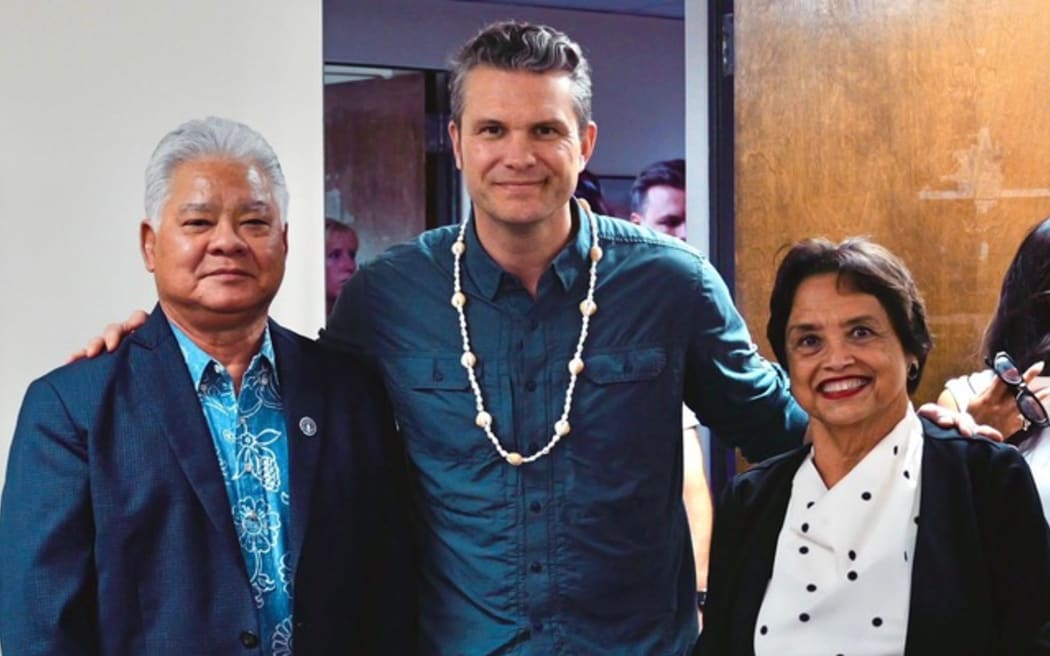 Secretary of Defense Pete Hegseth, middle, with CNMI Governor Arnold Palacios, left, and Guam Governor Lou Leon Guerrero, right.