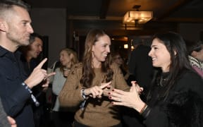 PARK CITY, UTAH - JANUARY 26: Jacinda Ardern (C) and Shoshannah Stern (R) attend HBO Documentary Films' Sundance party at Ruth's Chris Steak House on January 26, 2025 in Park City, Utah.   David Becker/Getty Images for HBO /AFP (Photo by David Becker / GETTY IMAGES NORTH AMERICA / Getty Images via AFP)