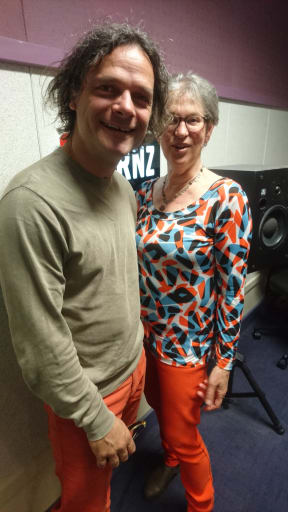 Pianist Jonathan Crayford and Upbeat presenter Eva Radich in their matching orange pants.