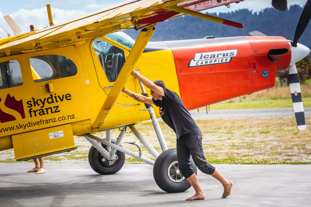 Skydiver prepares the plane at the skydive centre at Franz Josef Glacier in 2018.