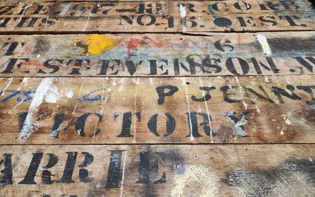 Graffiti on the boards of the Flock House woolshed, part of a Bulls Museum display