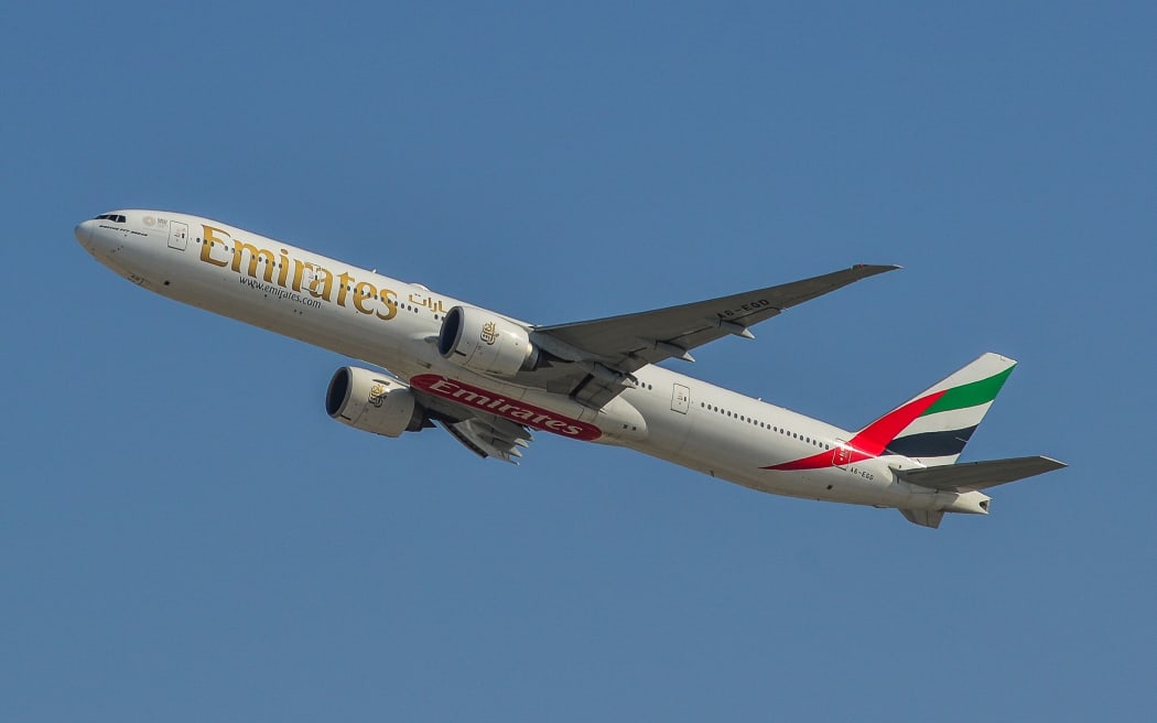 Dubai, UAE - Dec 9, 2018. A Boeing 777-300ER airplane of Emirates taking-off from Dubai Airport (DXB). DXB is the third-busiest airport in the world.