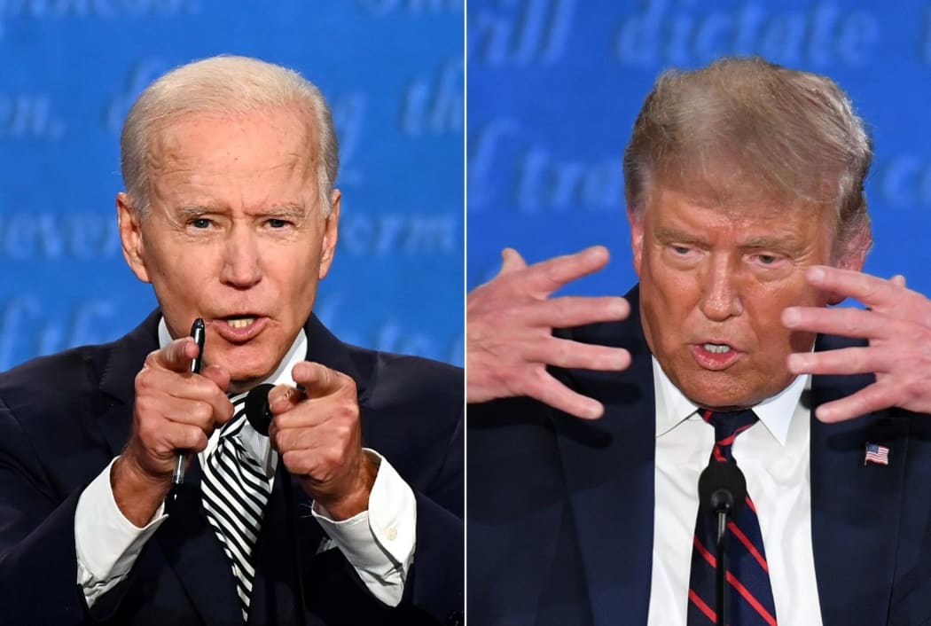 Democratic Presidential candidate and former US Vice President Joe Biden (L) and US President Donald Trump speaking during the first presidential debate at the Case Western Reserve University and Cleveland Clinic in Cleveland, Ohio