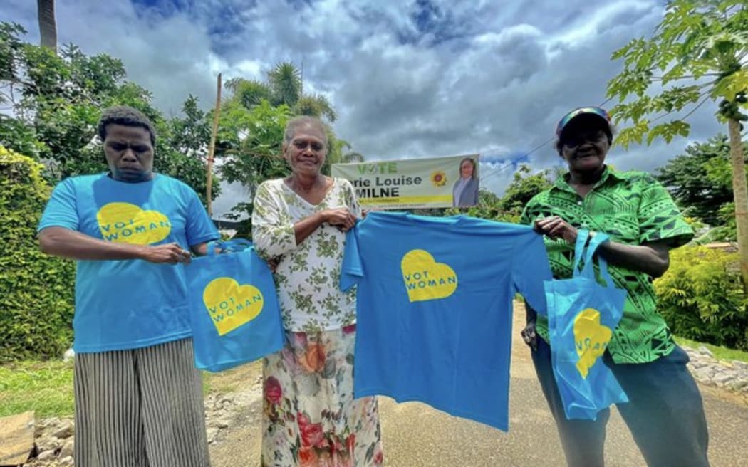 Campaigners for women parliamentarians hold “Vot Woman” t-shirts on polling day to support Marie Louise Milne in the Efate electorate, pictured on Jan. 16, 2025.