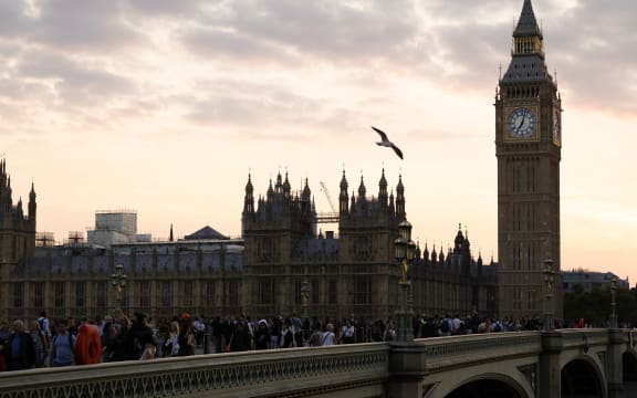 Members of the public join the queue on Westminster Bridge, as they wait in line to pay their respects to the late Queen Elizabeth II, Lying-in-State in the Palace of Westminster in London on 14 September, 2022.