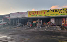 The burnt wreckage of the "Kwality Mini Bazaer"