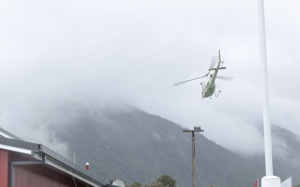 The first recovery chopper leaves for the Fox Glacier.