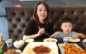 Scarlett Jin celebrating the Chinese New Year Eve with her four-year-old son.
