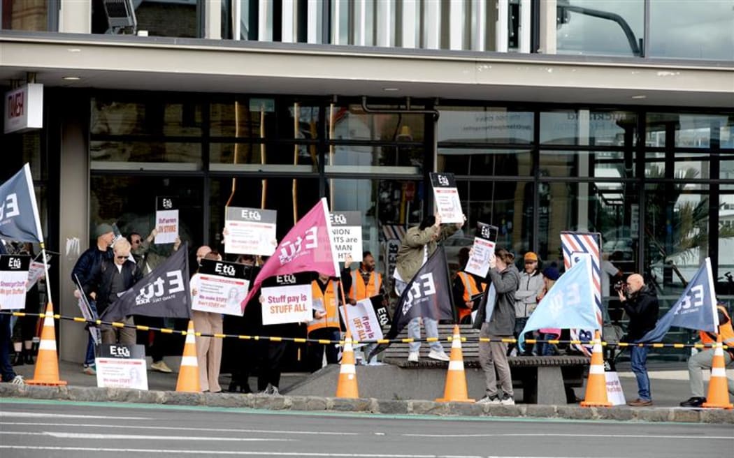 Staff at Stuff in Auckland are striking over low pay offers and what they say are attempts to divide the workforce. 28 August 2025