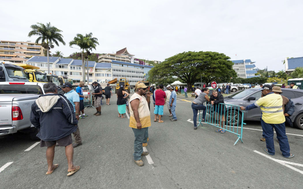 Mining industry truck drivers gather outside the local government at the start of August amidst ongoing protests in Noumea against a government decision on nickel exports to China.August 5 2015