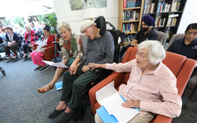 Margot, Gordon and Jocelyn Nicholson take part in the CeleBRation Choir, which brings together people of all ages who have a neurological condition for music therapy for a special session at Auckland's Elizabeth Knox Home and Hospital.