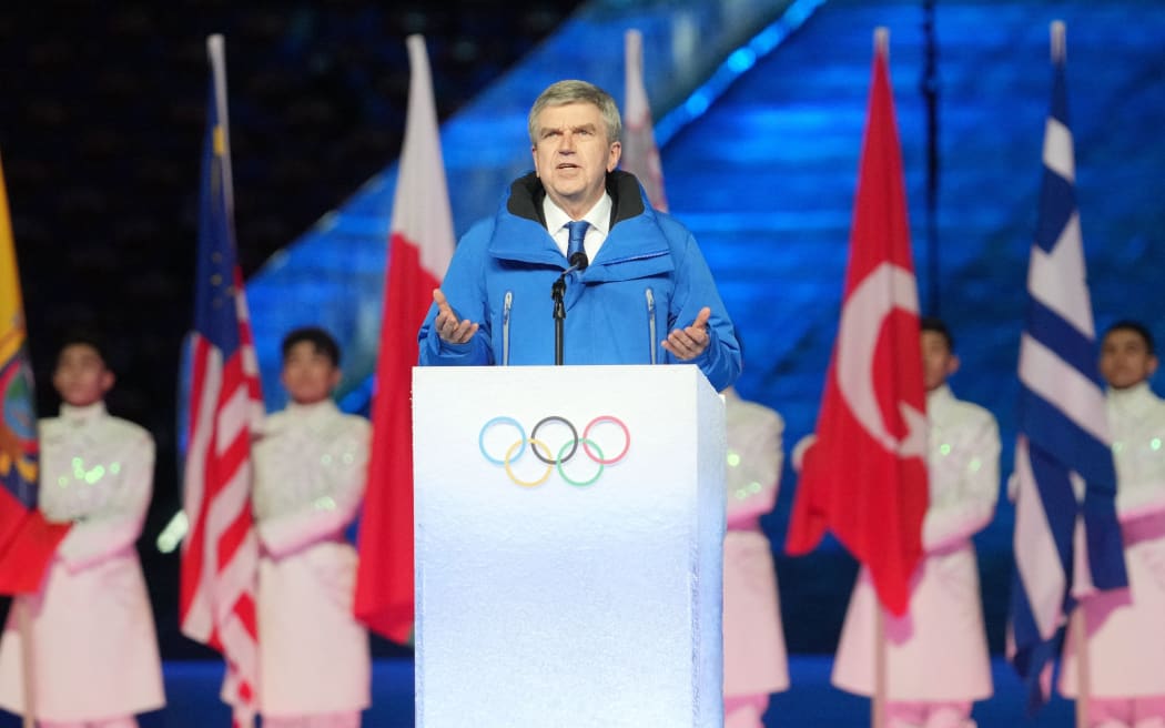 International Olympic Committee  President Thomas Bach speaking at the Beijing Winter Olympics closing ceremony.
