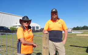 Fencers Gaylene Little and her son George Little have plenty of work ahead after Cyclone Gabrielle destroyed a huge amount of farm fences
