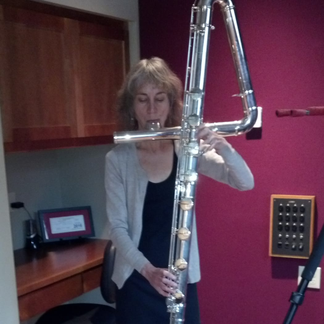 Flutist Tessa Brinckman playing the contrabass flute