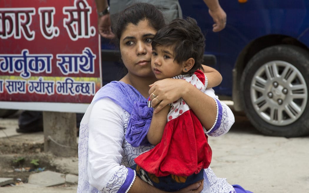 Kathmandu residents took to the streets after the powerful earthquake.