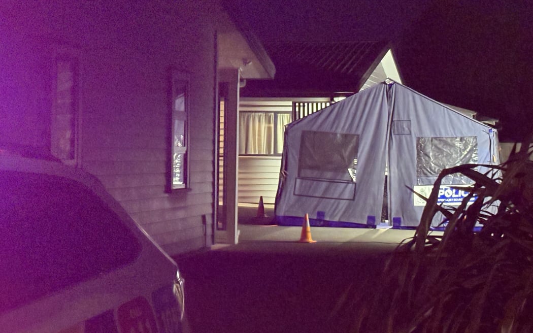 Police at the site of a double shooting that resulted in one dead and one critically injured in Christchurch.