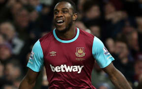 Michail Antonio celebrates scoring a goal for West Ham.