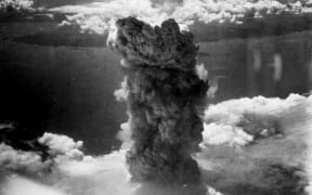 The mushroom cloud of the atomic bombing of the Japanese city of Nagasaki on August 9, 1945 rose some 11 mi (18 km) above the bomb's hypocenter.