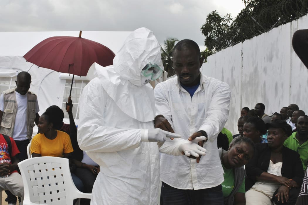 A volunteer health worker being trained at a new Ebola virus treatment center in Monrovia, Liberia, in September.