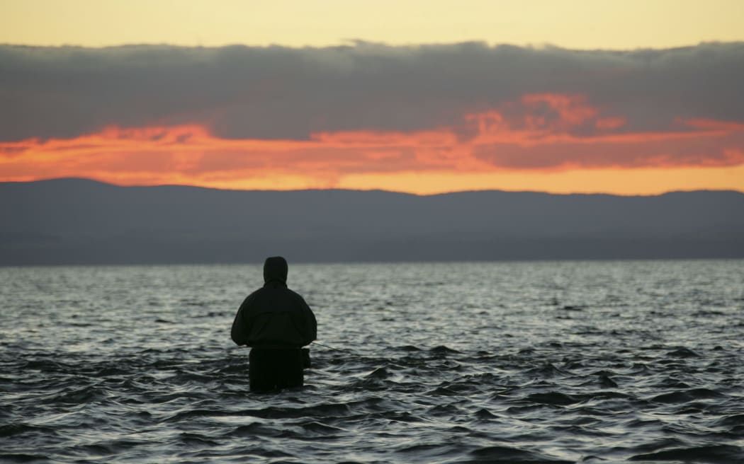 A fisher at Lake Taupo.