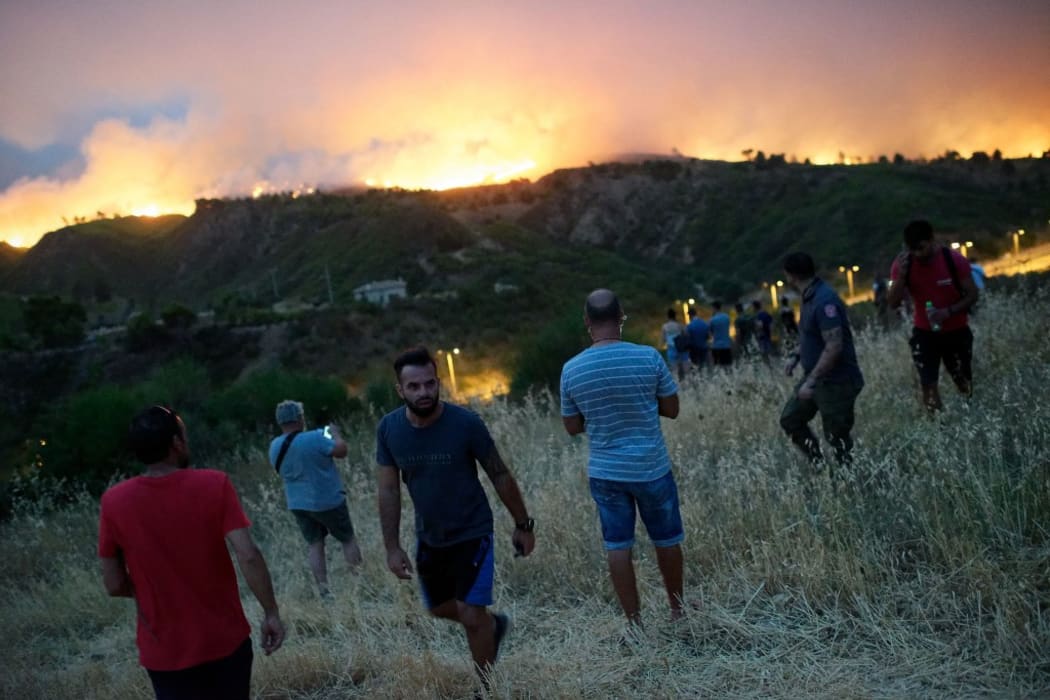 Residential areas in Athens northern suburbs were evacuated after wildfires reached the outskirts of the city as Greece is suffering its worst heatwave in decades with temperatures set to reach 45C.