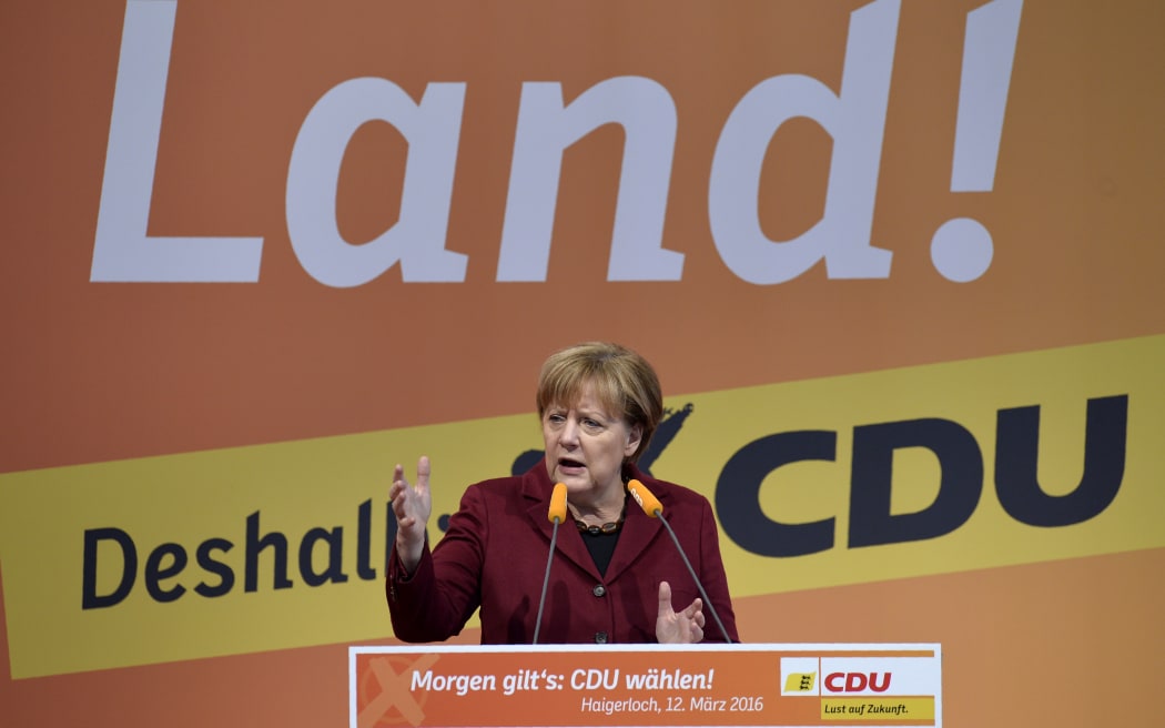 German chancellor Angela Merkel delivers a speech at the last electoral meeting in Haigerloch, southwestern Germany, ahead of regional state elections.