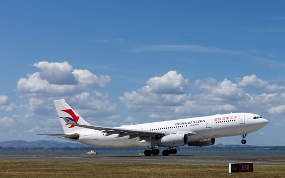 Aucklnd International Terminal, airside planes  - China Eastern plane at Auckland International Airport