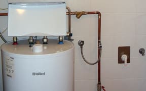 Hot water cylinder.