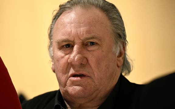 (FILES) French actor Gerard Depardieu arrives on the fourth day of his trial in which he is charged with sexually assaulting two women during a film shoot in 2021, at the Paris criminal court in the Tribunal de Paris courthouse, on March 27, 2025. French actor Gerard Depardieu, tried for the sexual assault against two women, will recieve a judgement at the Batignolles Judicial Court, in Paris on May 13, 2025.