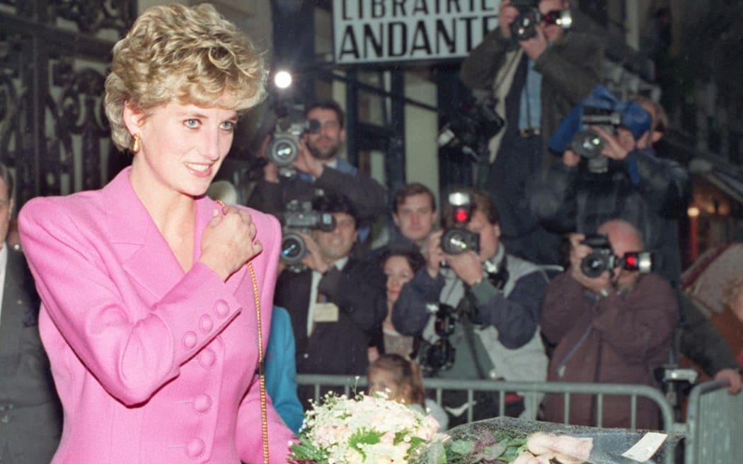 In this file photo taken on 14 November 1992 Princess Diana leaves a bookshop in Paris.