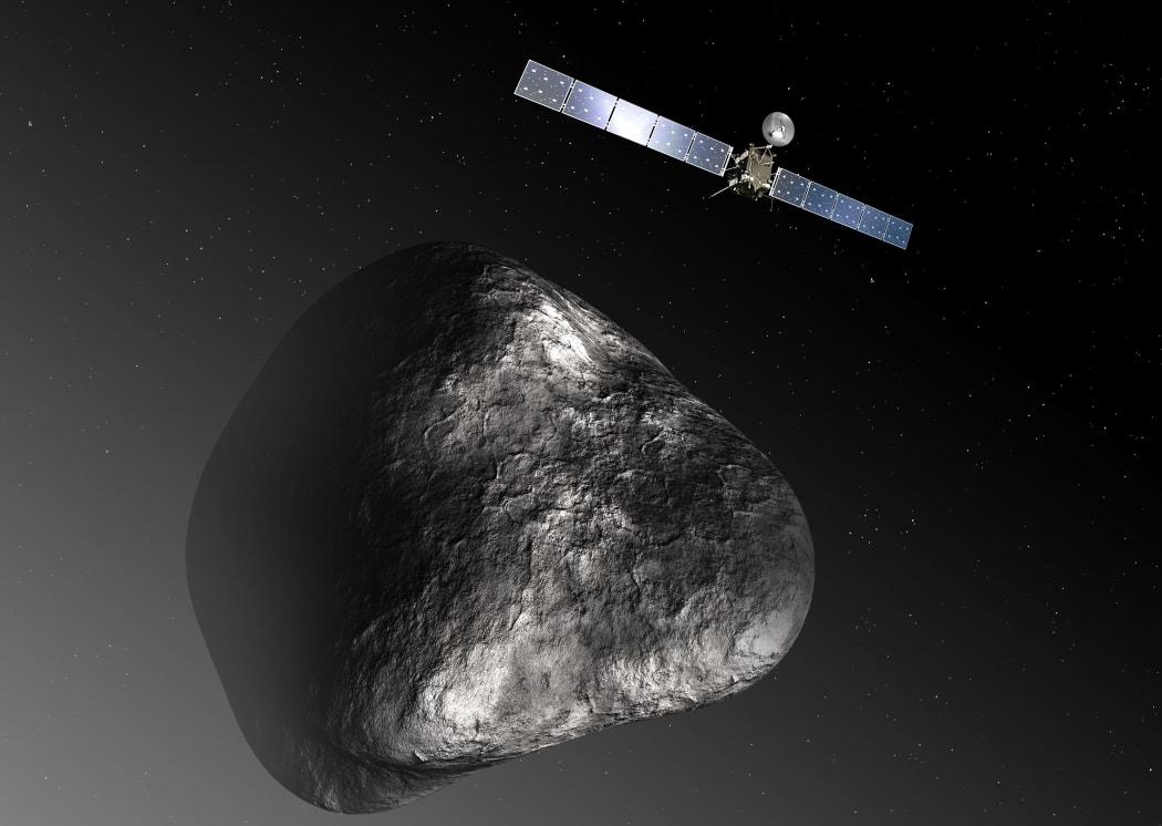 An artist's impression released by the European Space Agency of the Rosetta orbiter and the comet.