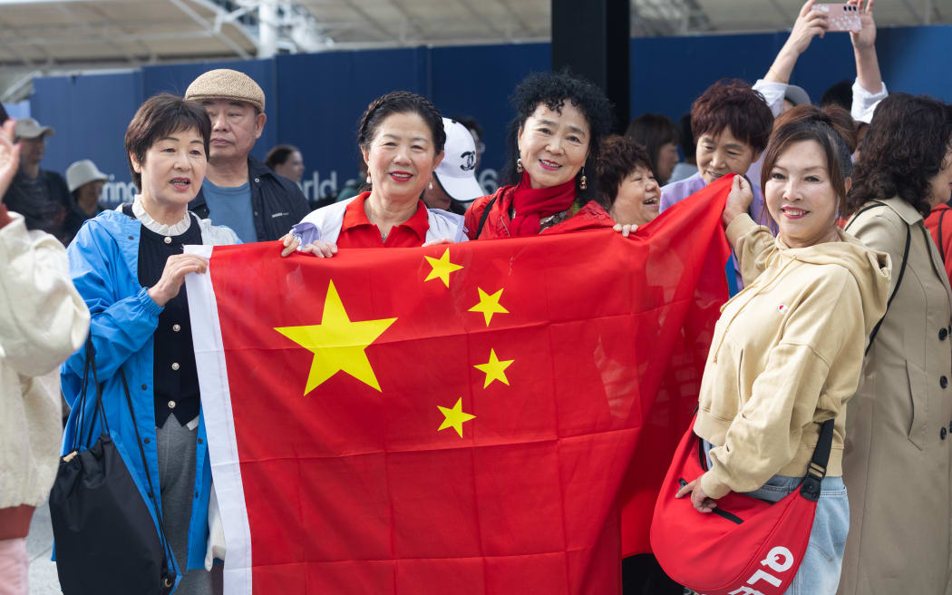 Supporters outside Auckland Airport for Zhao Leji’s visit.