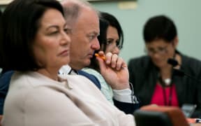 National MPs Hekia Parata (left), Jono Naylor (right), and Parmjeet Parmar listen to the Ministry for Vulnerable Children, Oranga Tamariki give evidence to the Justice and Electoral Committee.