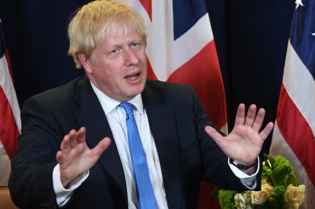 British PM Boris Johnson speaks to the media at UN Headquarters in New York, September 24, 2019