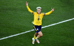 Sweden's Lina Hurtig celebrates her winning penalty shoot out goal against USA at the 2023 World Cup.
