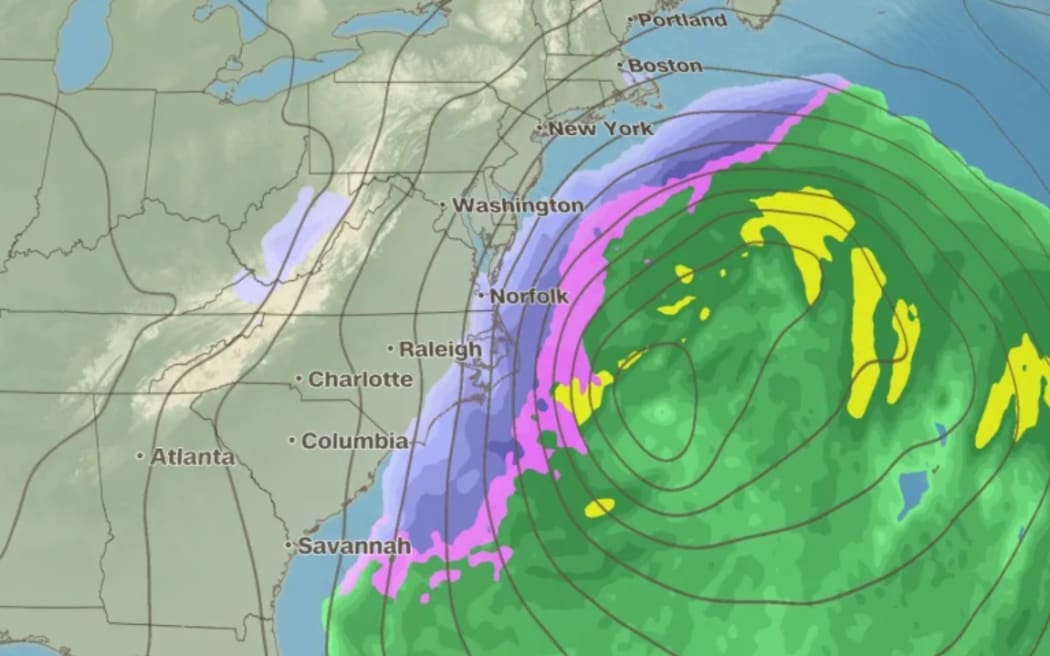 This is a single computer model run showing how the storm could look in scenario one with snow (purples) and wind impacting mostly coastal areas.