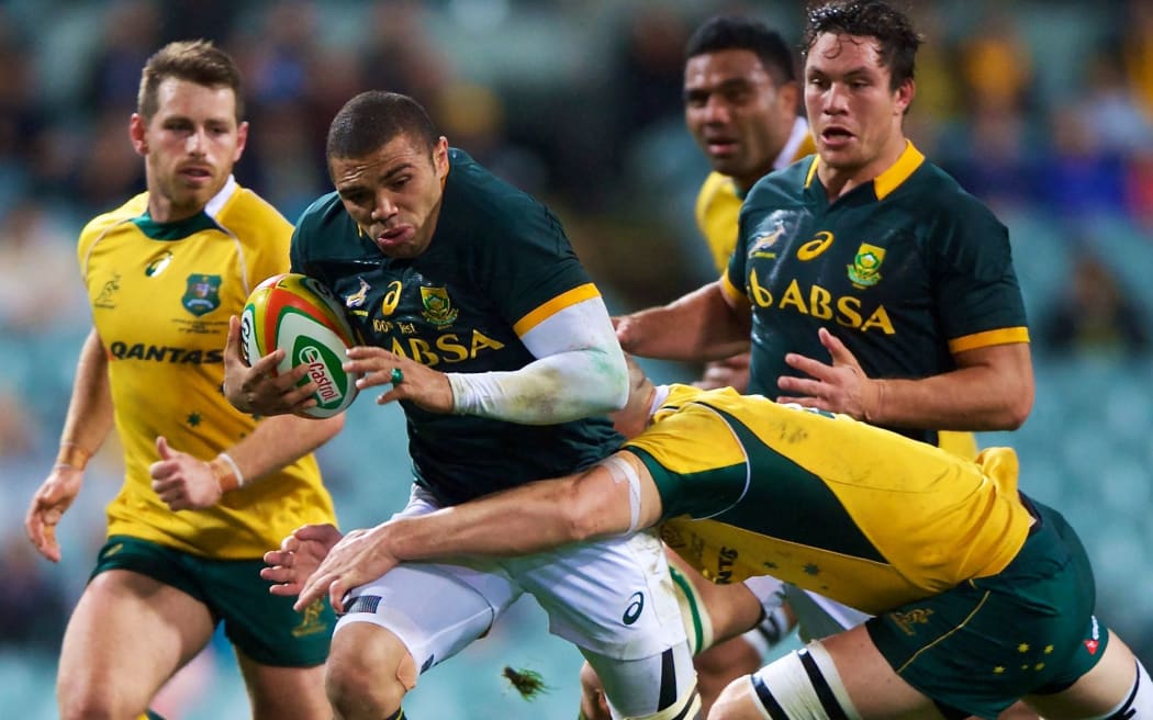 Bryan Habana of the Springboks is tackled by Scott Fardy of the Wallabies. September 2014.
