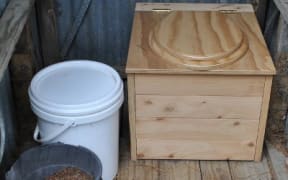Wooden compost toilet made by Greg Inwood