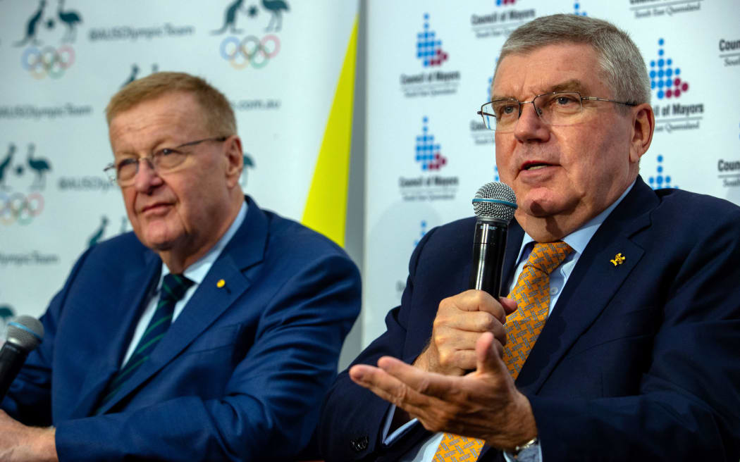 International Olympic Committee (IOC) president Thomas Bach (R) and president of the Australian Olympic Committee John Coates (L) attend a press conference in Brisbane on May 6, 2019.