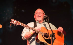 Eric Bogle on stage in 2014