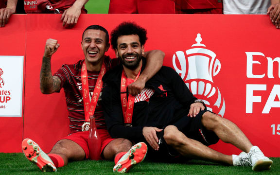 2022 FA Cup Final, Chelsea versus Liverpool: Mohamed Salah (R) of Liverpool poses with Thiago Alcantara of Liverpool after beating Chelsea in a penalty shootout