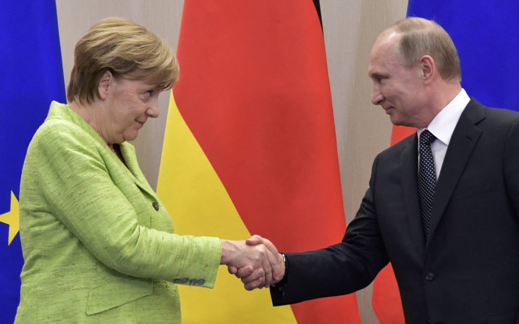 Russian President Vladimir Putin and the Federal Chancellor of Germany Angela Merkel during a joint press conference on the outcome of their meeting.