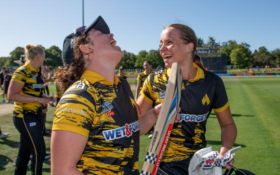 Georgia Plimmer, left, and Jess Kerr celebrate Wellington Blaze's win in the Super Smash grand final against Auckland Hearts at Hagley Oval, Christchurch, New Zealand, 31th January 2026. Copyright photo: John Davidson / www.photosport.nz