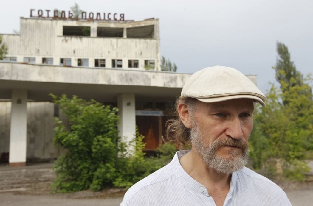 Alexiy Breus, operator of the 4th power unit, on the day of the accident, speaks to journalists in the abandoned city of Pripyat, near the Chernobyl nuclear power plant, Ukraine, on 7 June 2019.