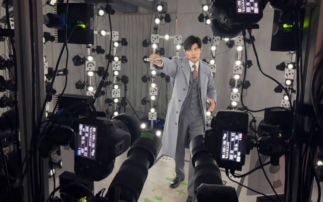 Behind the scenes image of Jay Chou from the Children of the Sun music video.